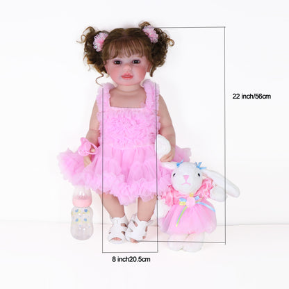 Poupée Reborn de 22 pouces - Mouvement joyeux avec un visage peint 3D, un corps en vinyle souple et des cheveux racinés, accompagné d'un petit lapin en peluche, parfait pour des cadeaux de Noël, d'Halloween ou de Thanksgiving.