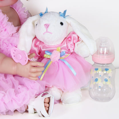 Poupée Reborn de 22 pouces - Mouvement joyeux avec un visage peint 3D, un corps en vinyle souple et des cheveux racinés, accompagné d'un petit lapin en peluche, parfait pour des cadeaux de Noël, d'Halloween ou de Thanksgiving.
